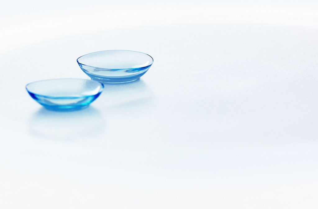 A pair of scleral contact lenses against a white background.